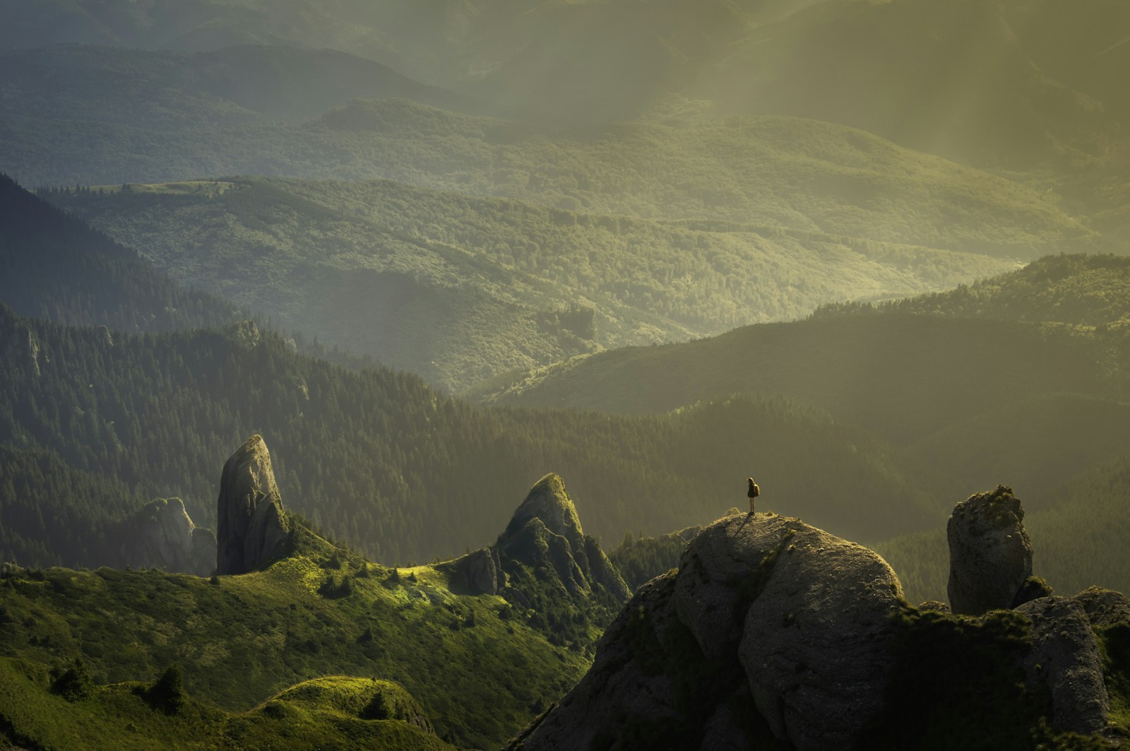 Dramatic alpine peaks above a green valley